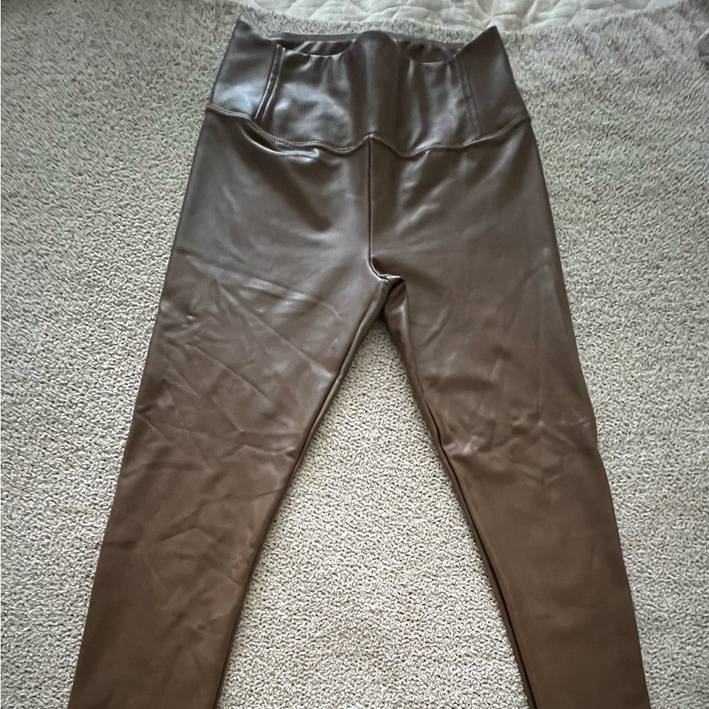 Wore once dark brown leather skinny pants.